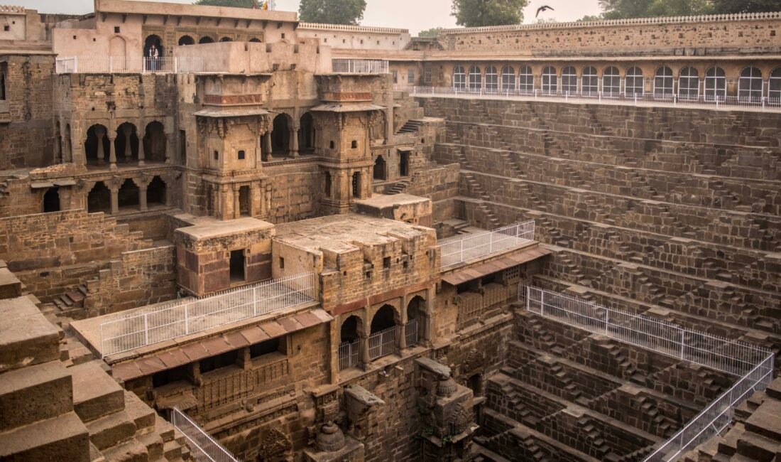 Wide view of Chand Baori Abhaneri showing its historic pavilion and symmetrical steps