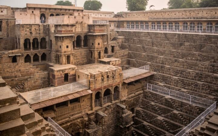 Wide view of Chand Baori Abhaneri showing its historic pavilion and symmetrical steps