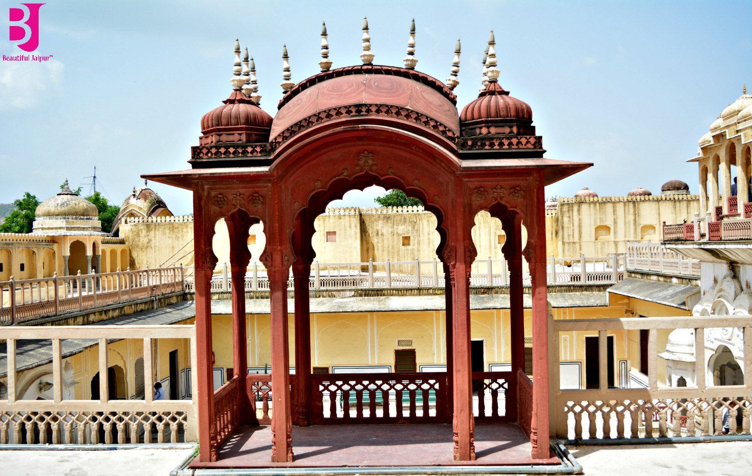 Decorative red pavilion inside Hawa Mahal courtyard