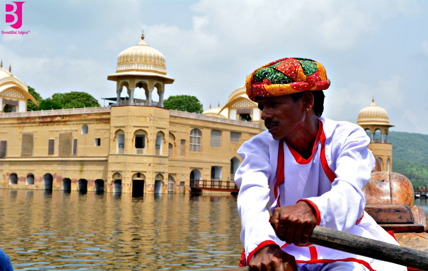 Historic boatman view with Jal Mahal palace in the background