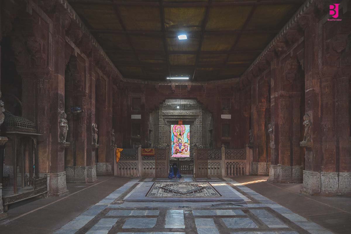 Carved stone hall and sanctum inside Jagat Shiromani Temple Amer