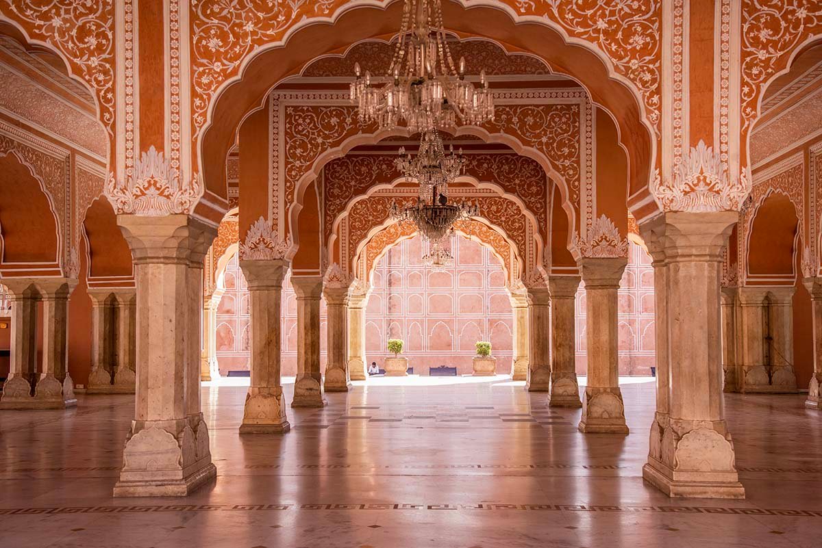 Ornate arches and chandeliers inside Sabha Niwas at City Palace Jaipur