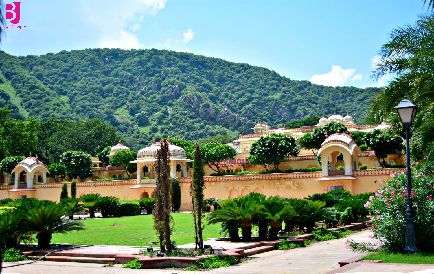 Landscaped lawns and palace pavilions at Sisodia Rani Garden Jaipur