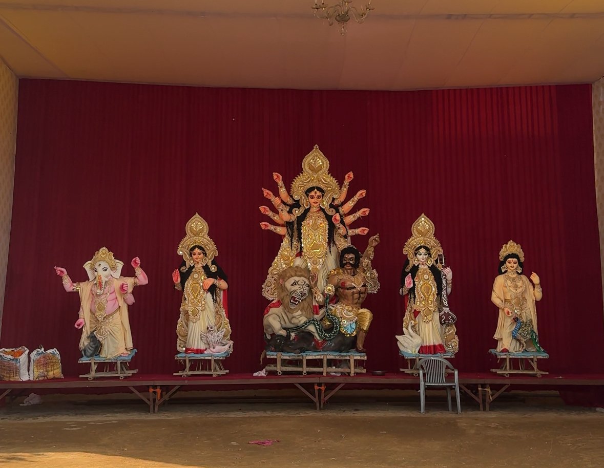 Durga idol arrangement on a stage during preparations in Jaipur